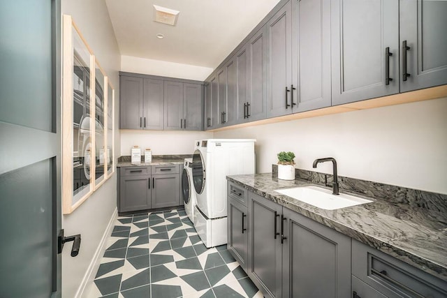 123 Polo Way, Santa Barbara, CA 93013 - washroom featuring cabinet space, washing machine and clothes dryer, and dark floors