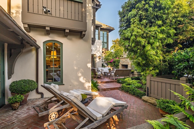 1479 Bonnymede Dr, Santa Barbara, CA 93108 - view of patio / terrace with an outdoor living space with a fireplace