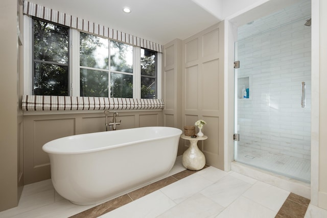 1479 Bonnymede Dr, Santa Barbara, CA 93108 - bathroom with a decorative wall, a stall shower, a freestanding tub, and recessed lighting