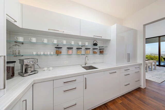 356 Woodley Rd, Montecito, CA 93108 - bar area with a sink, dark wood-style floors, and backsplash