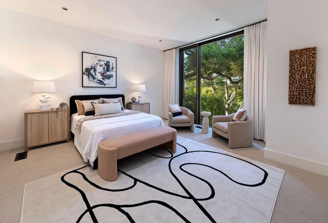 356 Woodley Rd, Montecito, CA 93108 - bedroom with light carpet, floor to ceiling windows, and baseboards
