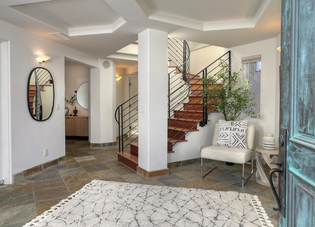 62 Canon View Rd, Montecito, CA 93108 - foyer entrance with a tray ceiling, stone tile floors, baseboards, and stairway