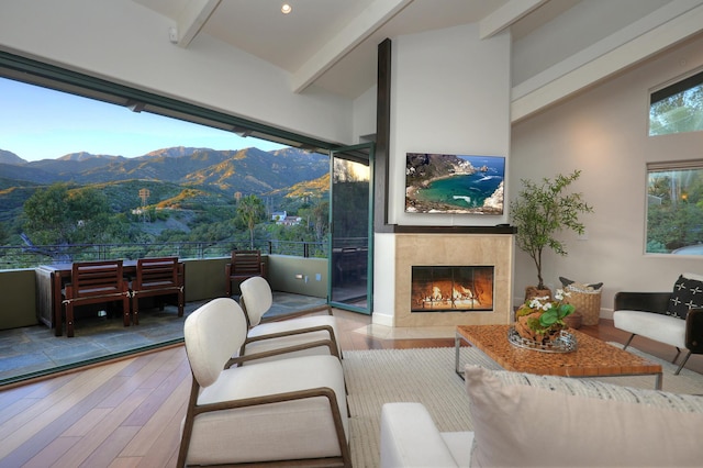 62 Canon View Rd, Montecito, CA 93108 - living area featuring wood finished floors, beamed ceiling, and a premium fireplace