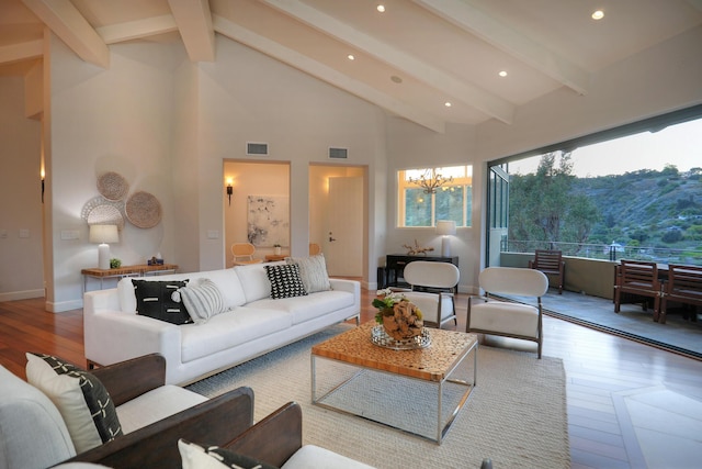62 Canon View Rd, Montecito, CA 93108 - living area with beamed ceiling, wood finished floors, a chandelier, recessed lighting, and baseboards