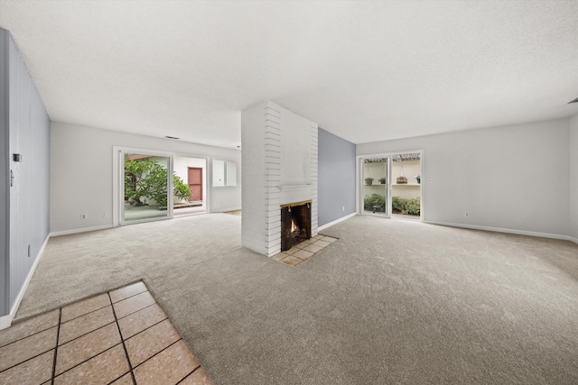 4634 Puente Plz, Santa Barbara, CA 93110 - unfurnished living room featuring carpet flooring and a fireplace