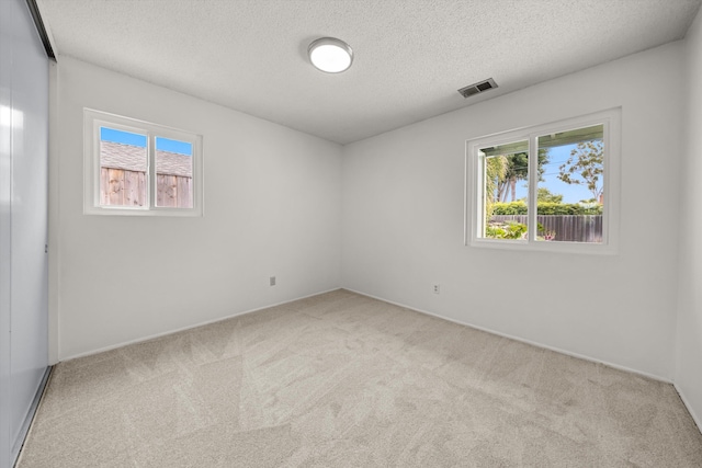 4634 Puente Plz, Santa Barbara, CA 93110 - spare room with carpet floors and a textured ceiling