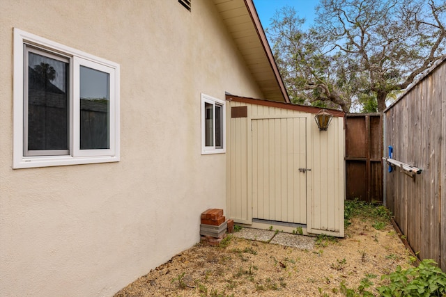 4634 Puente Plz, Santa Barbara, CA 93110 - view of home's exterior with a storage unit and stucco siding