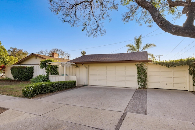 4634 Puente Plz, Santa Barbara, CA 93110 - single story home with an attached garage, roof with shingles, and driveway