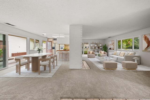 4634 Puente Plz, Santa Barbara, CA 93110 - carpeted dining room with decorative columns and a textured ceiling