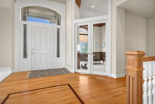 11719 SE Solomon Ct, Happy Valley, OR 97086 - foyer with light wood-style flooring, french doors, and baseboards