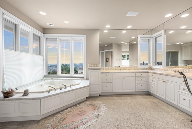 11719 SE Solomon Ct, Happy Valley, OR 97086 - bathroom featuring double vanity, a whirlpool tub, and recessed lighting
