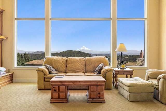 11719 SE Solomon Ct, Happy Valley, OR 97086 - carpeted living room with a mountain view and baseboards