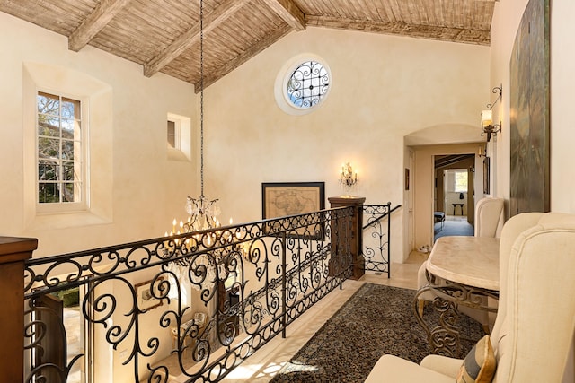 4451 Via Alegre, Santa Barbara, CA 93110 - hall featuring a chandelier, wooden ceiling with exposed beams, arched walkways, and high vaulted ceiling