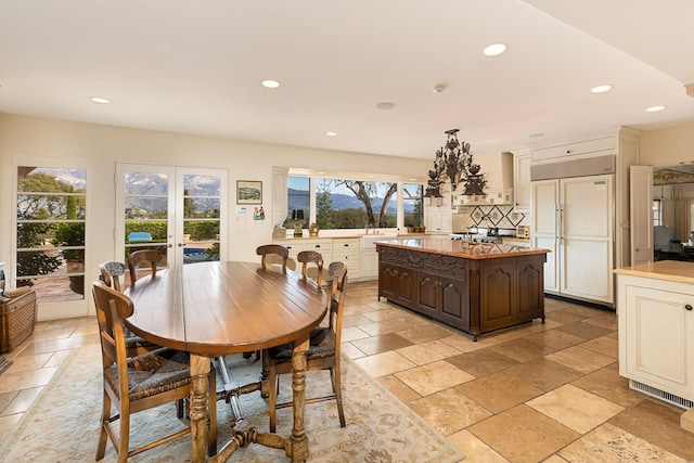 4451 Via Alegre, Santa Barbara, CA 93110 - dining room featuring recessed lighting, french doors, and stone tile floors