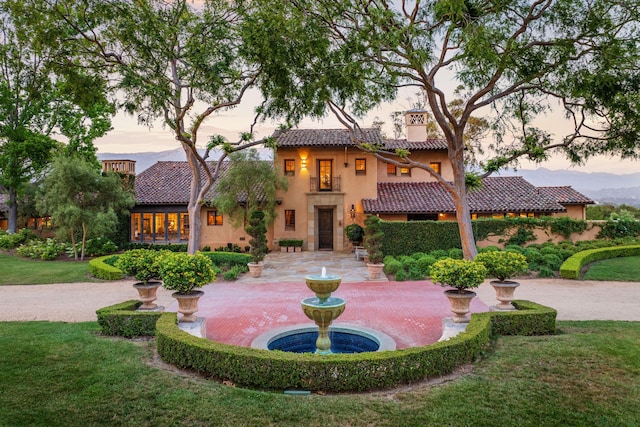 4451 Via Alegre, Santa Barbara, CA 93110 - mediterranean / spanish house featuring a tile roof, stucco siding, a chimney, and a yard