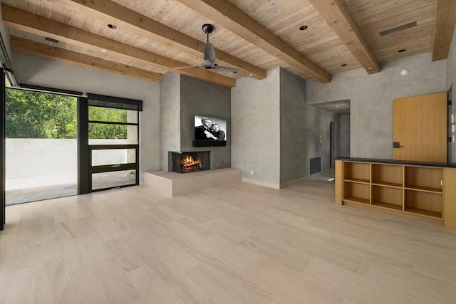 892 Toro Canyon Rd, Montecito, CA 93108 - unfurnished living room featuring a wooden ceiling with exposed beams, a multi sided fireplace, and ceiling fan