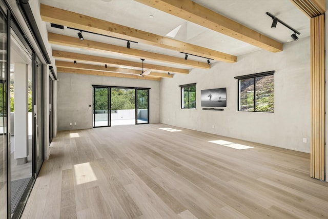 892 Toro Canyon Rd, Montecito, CA 93108 - unfurnished room featuring rail lighting, light wood-style flooring, and beamed ceiling