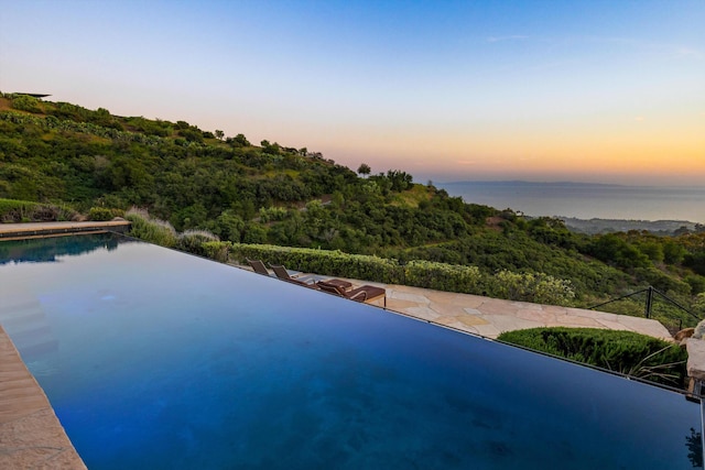 892 Toro Canyon Rd, Montecito, CA 93108 - view of pool featuring a wooded view