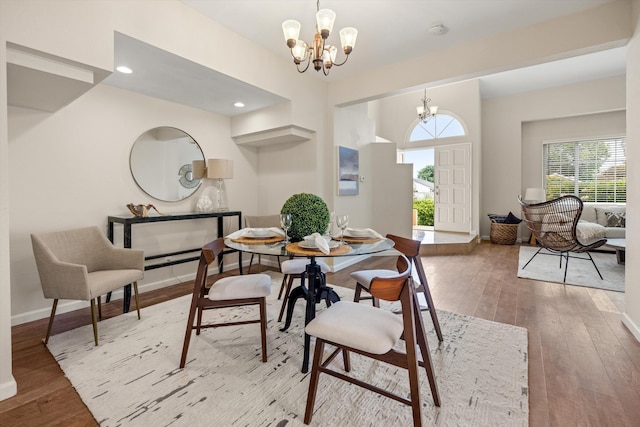 7134 Phelps Rd, Goleta, CA 93117 - dining room featuring a chandelier, baseboards, light wood-type flooring, and recessed lighting