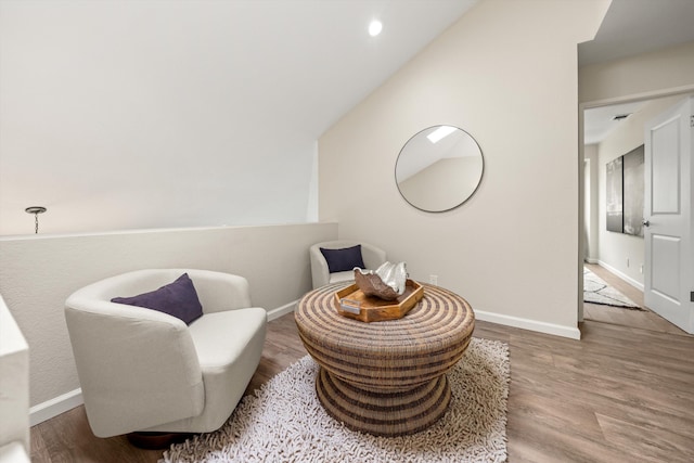 7134 Phelps Rd, Goleta, CA 93117 - living area with wood finished floors, baseboards, and recessed lighting