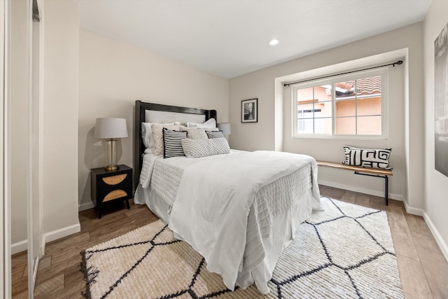 7134 Phelps Rd, Goleta, CA 93117 - bedroom with baseboards, recessed lighting, and light wood-type flooring