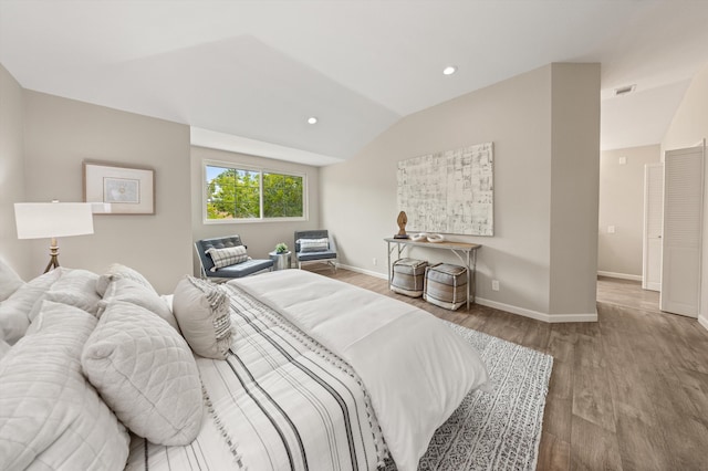 7134 Phelps Rd, Goleta, CA 93117 - bedroom with wood finished floors, lofted ceiling, baseboards, and recessed lighting