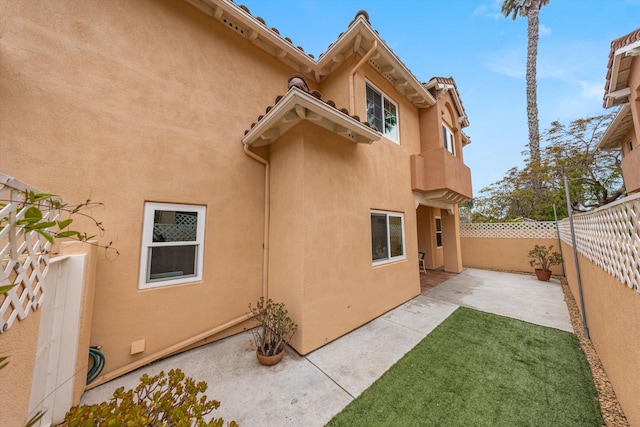 7134 Phelps Rd, Goleta, CA 93117 - back of property with stucco siding and a patio area