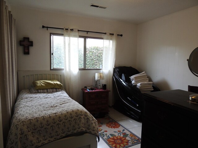 1307 San Andres St, Santa Barbara, CA 93101 - bedroom with light tile patterned floors and a desk