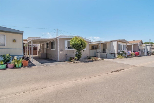1600 E Clark Ave Spc 165, Santa Maria, CA 93455 - manufactured / mobile home with a carport