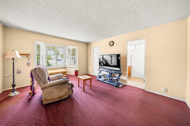 4595 Aragon Dr, Carpinteria, CA 93013 - carpeted living area with a textured ceiling and baseboards