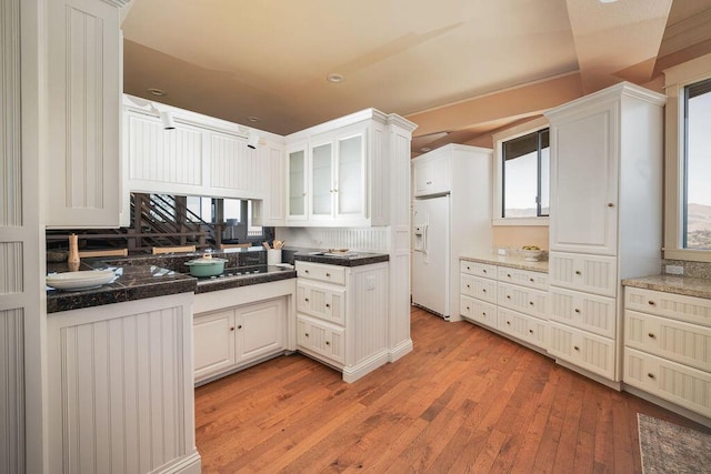 1110 Deer Canyon Rd, Arroyo Grande, CA 93420 - kitchen featuring white refrigerator with ice dispenser, light wood-style floors, white cabinetry, and recessed lighting