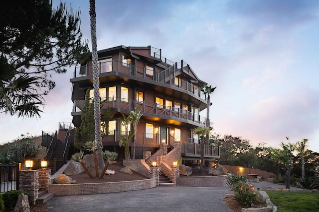 1110 Deer Canyon Rd, Arroyo Grande, CA 93420 - view of front of property featuring a balcony, stairs, and driveway