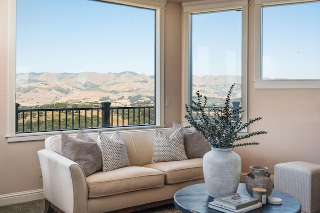 1110 Deer Canyon Rd, Arroyo Grande, CA 93420 - living room featuring a mountain view, baseboards, and healthy amount of natural light