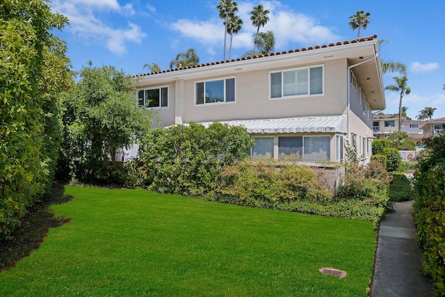 2641 State St Unit 2, Santa Barbara, CA 93105 - view of side of property featuring a lawn and stucco siding