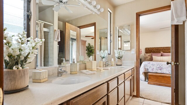 1010 Portesuello Ave, Santa Barbara, CA 93105 - bathroom with ceiling fan, double vanity, tile patterned flooring, and ensuite bathroom