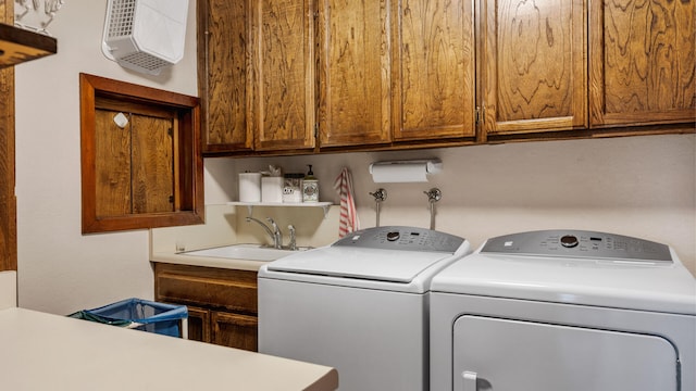 1010 Portesuello Ave, Santa Barbara, CA 93105 - laundry area featuring washing machine and clothes dryer and cabinet space