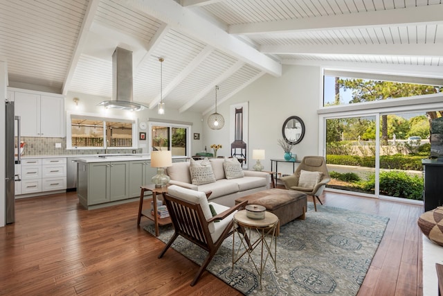 533 N La Cumbre Rd, Santa Barbara, CA 93110 - living area with dark wood finished floors, beamed ceiling, and high vaulted ceiling