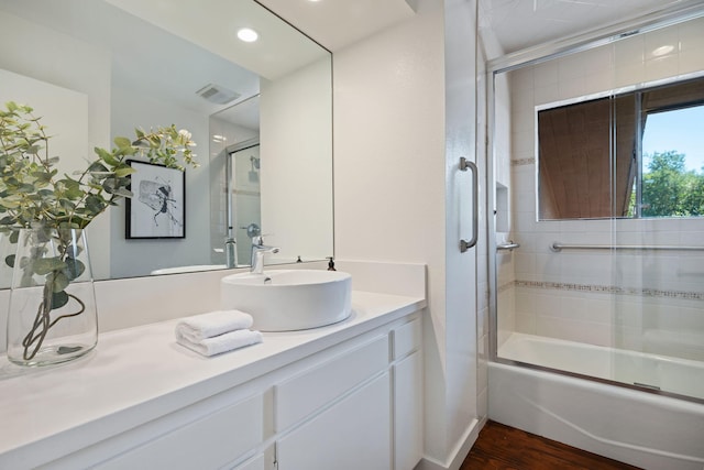 2031 Cielito Ln, Santa Barbara, CA 93105 - full bathroom featuring vanity, bath / shower combo with glass door, wood finished floors, and recessed lighting