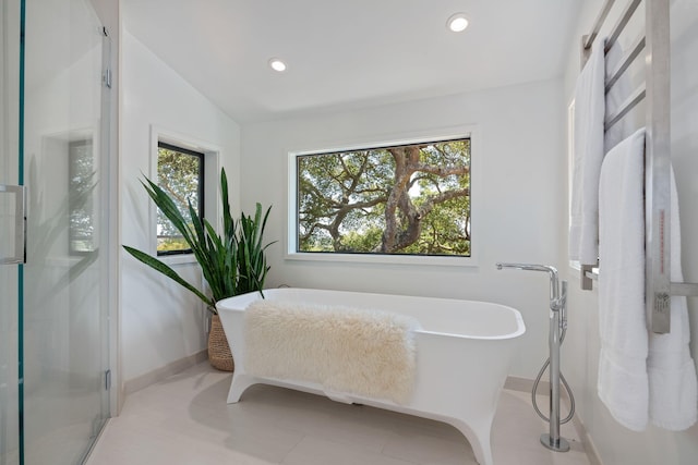 2031 Cielito Ln, Santa Barbara, CA 93105 - full bath featuring baseboards, recessed lighting, a soaking tub, and an enclosed shower