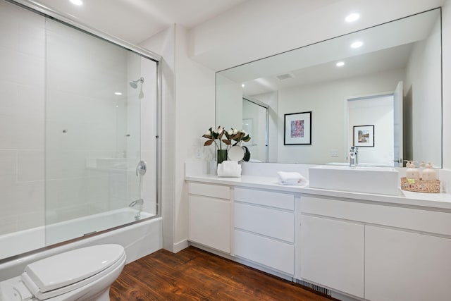 2031 Cielito Ln, Santa Barbara, CA 93105 - bathroom featuring toilet, wood finished floors, vanity, shower / bath combination with glass door, and recessed lighting