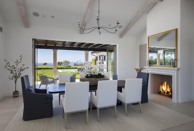 2720 Montecito Ranch Pl, Summerland, CA 93067 - dining room featuring beamed ceiling, a chandelier, healthy amount of natural light, a warm lit fireplace, and baseboards