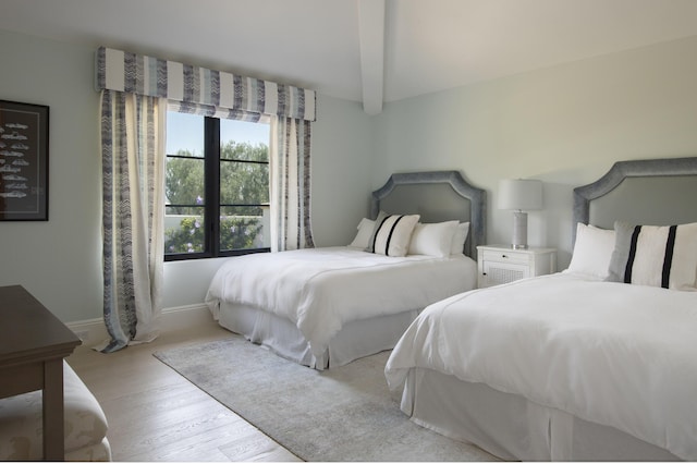 2720 Montecito Ranch Pl, Summerland, CA 93067 - bedroom featuring wood finished floors, beamed ceiling, and baseboards