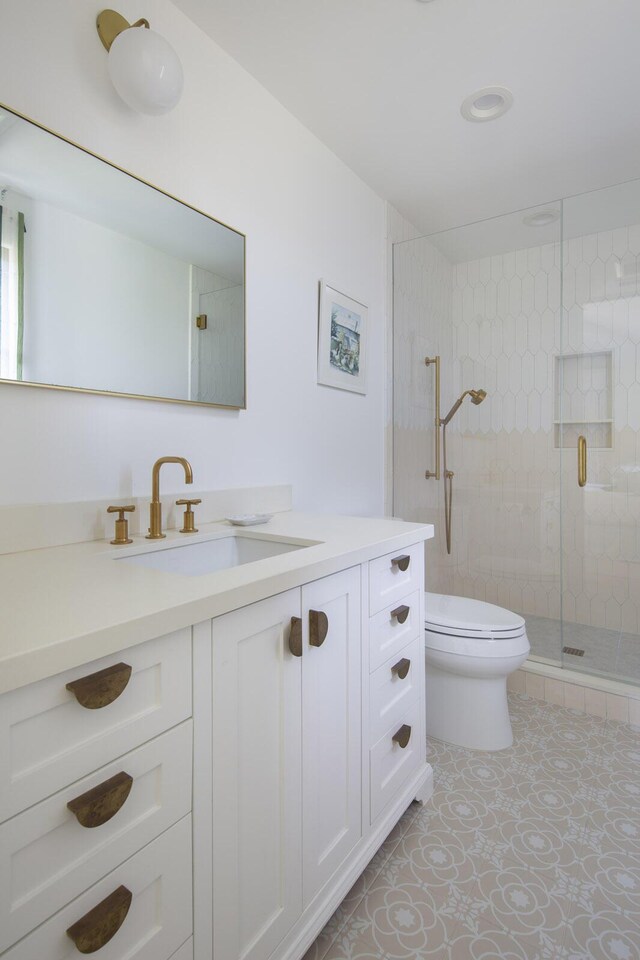 2720 Montecito Ranch Pl, Summerland, CA 93067 - bathroom featuring vanity, toilet, a stall shower, and tile patterned floors
