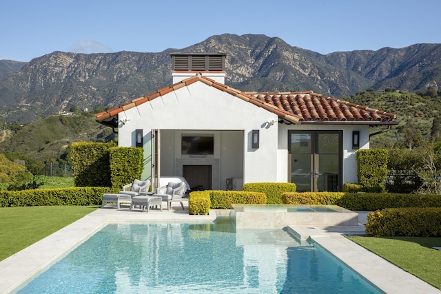 2720 Montecito Ranch Pl, Summerland, CA 93067 - rear view of property featuring a tiled roof, stucco siding, a lawn, and an outdoor pool