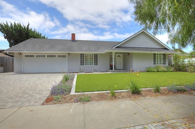 6231 Covington Way, Goleta, CA 93117 - single story home featuring an attached garage, decorative driveway, a chimney, and stucco siding