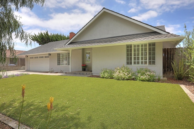 6231 Covington Way, Goleta, CA 93117 - view of front facade with stucco siding, an attached garage, a chimney, and concrete driveway