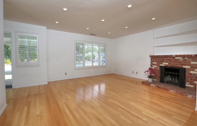 6231 Covington Way, Goleta, CA 93117 - unfurnished living room featuring light wood-style flooring, a fireplace, recessed lighting, and baseboards