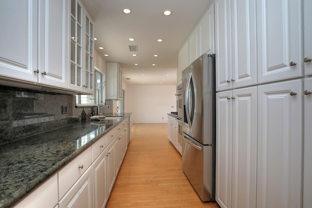 6231 Covington Way, Goleta, CA 93117 - kitchen featuring stainless steel appliances, white cabinetry, light wood-style flooring, recessed lighting, and glass insert cabinets