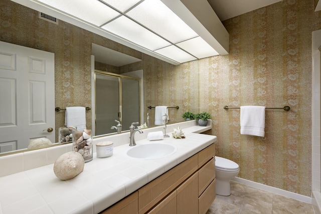 4477 S Shadow Hills Blvd Unit E, Santa Barbara, CA 93105 - bathroom featuring vanity, a stall shower, toilet, wallpapered walls, and tile patterned floors