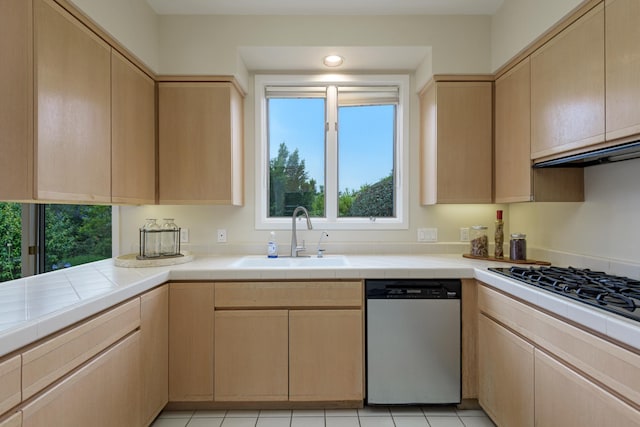 4477 S Shadow Hills Blvd Unit E, Santa Barbara, CA 93105 - kitchen with a sink, stainless steel dishwasher, light brown cabinetry, and tile countertops
